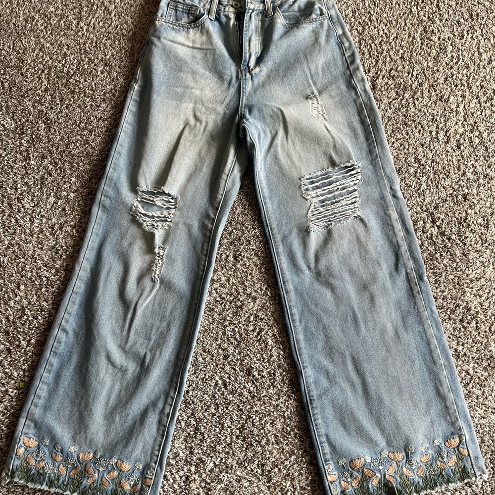 Light Blue Distressed Wide-Leg Jeans with Embroidered Hem